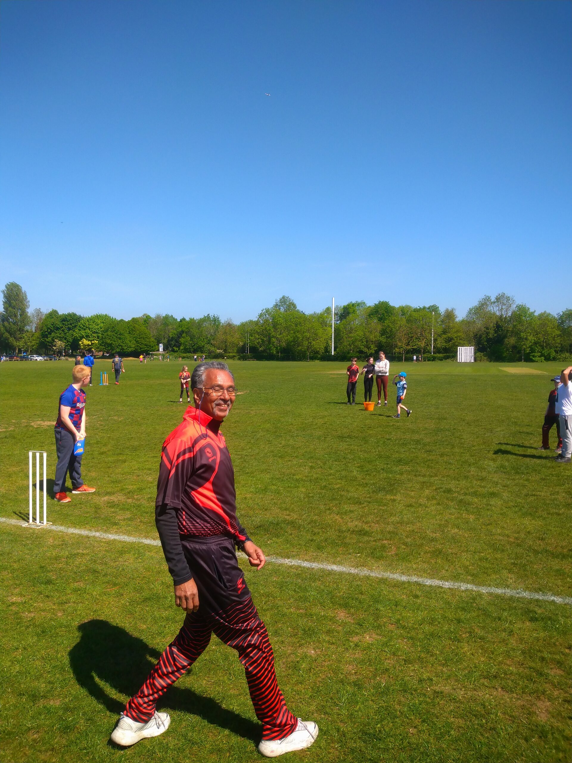 Chandra working with the colts at Guildford City Cricket Youth Project